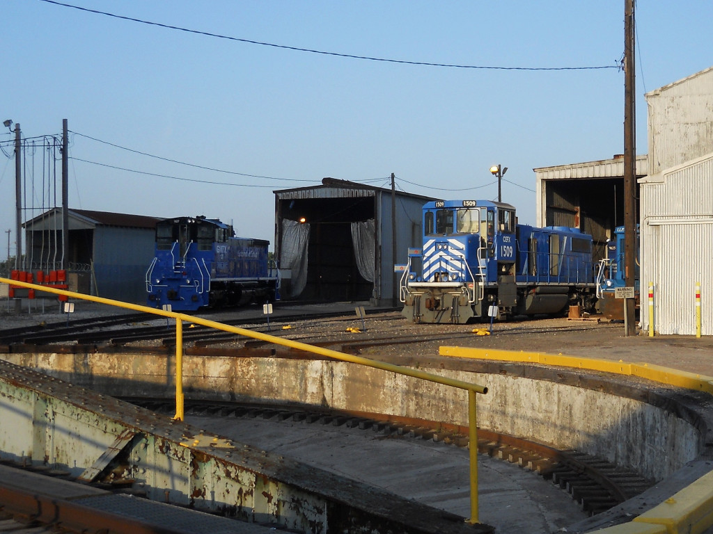 GMTX 127  28May2011  Across the turntable at WabTec - the old HBT Engine Shop - on Milby Street 